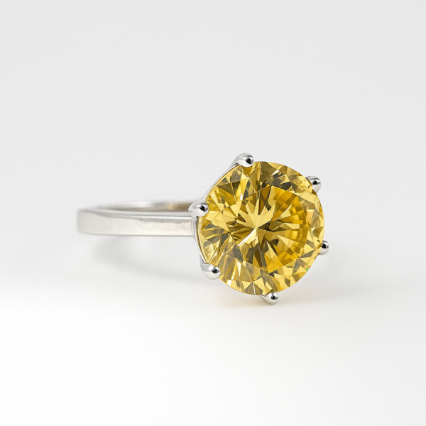 Anello Solitario in argento 925 pietra 10 mm bianca taglio brillante con baguette laterali